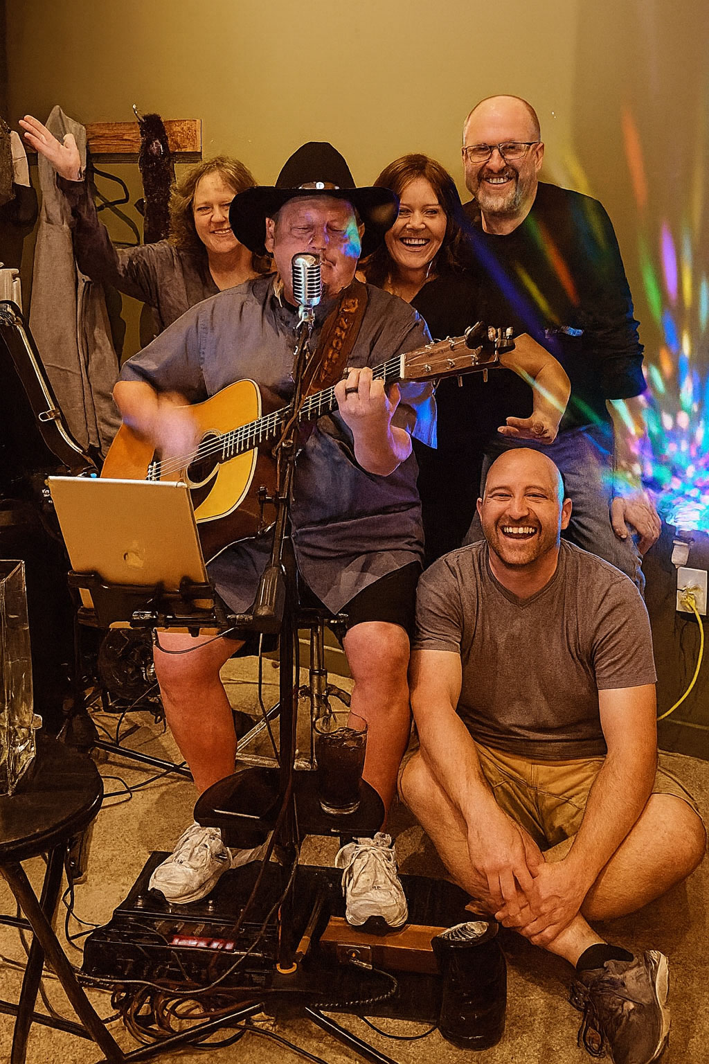 SmorgyMusic troubadour playing acoustic guitar at an Oregon Coast resort